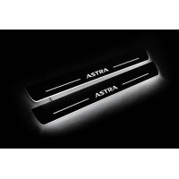 Накладки на пороги з підсвіткою Opel Astra J 2009-2015 (front doors) - (тип Static) Накладки на пороги з підсвіткою Opel Astra J 2009-2015 (front doors) - (тип Static)