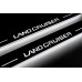 Накладки на пороги з підсвіткою Toyota Prado 250 2023+ з лого Land Cruiser (front doors) - (тип Static)