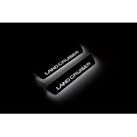 Накладки на пороги з підсвіткою Toyota Prado 250 2023+ з лого Land Cruiser (rear doors) - (тип Static) Накладки на пороги з підсвіткою Toyota Prado 250 2023+ з лого Land Cruiser (rear doors) - (тип Static)